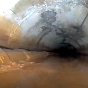 Drones view, inspecting the inside of a drain