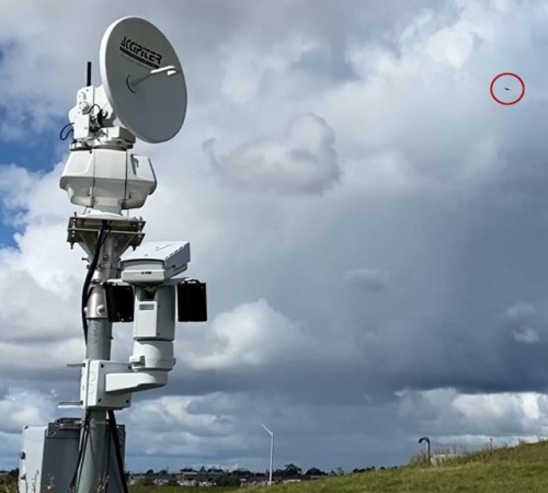 Counter-Unmanned Aircraft System detecting an aerial drone in a cloudy sky